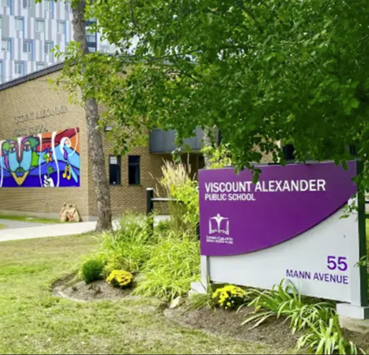 Viscount Alexander with school sign